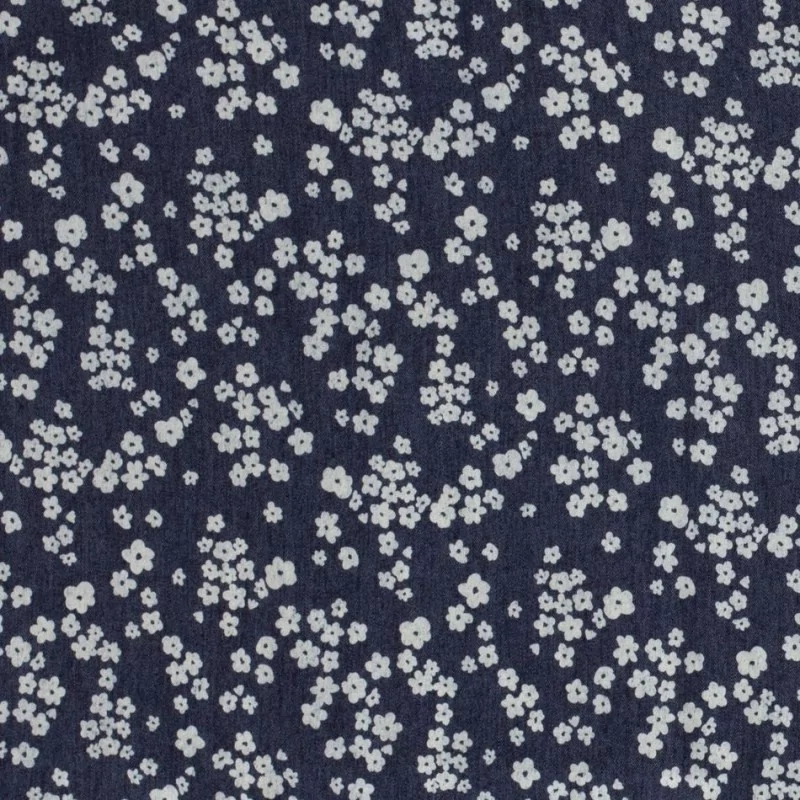 Tecido Jeans stretch azul escuro impresso com pequenas flores brancas | Tissus Loup
