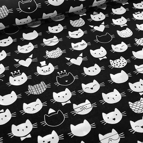 tecido de cabeças de gatos em fundo preto
